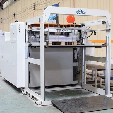 Stroj za polaganje papirja